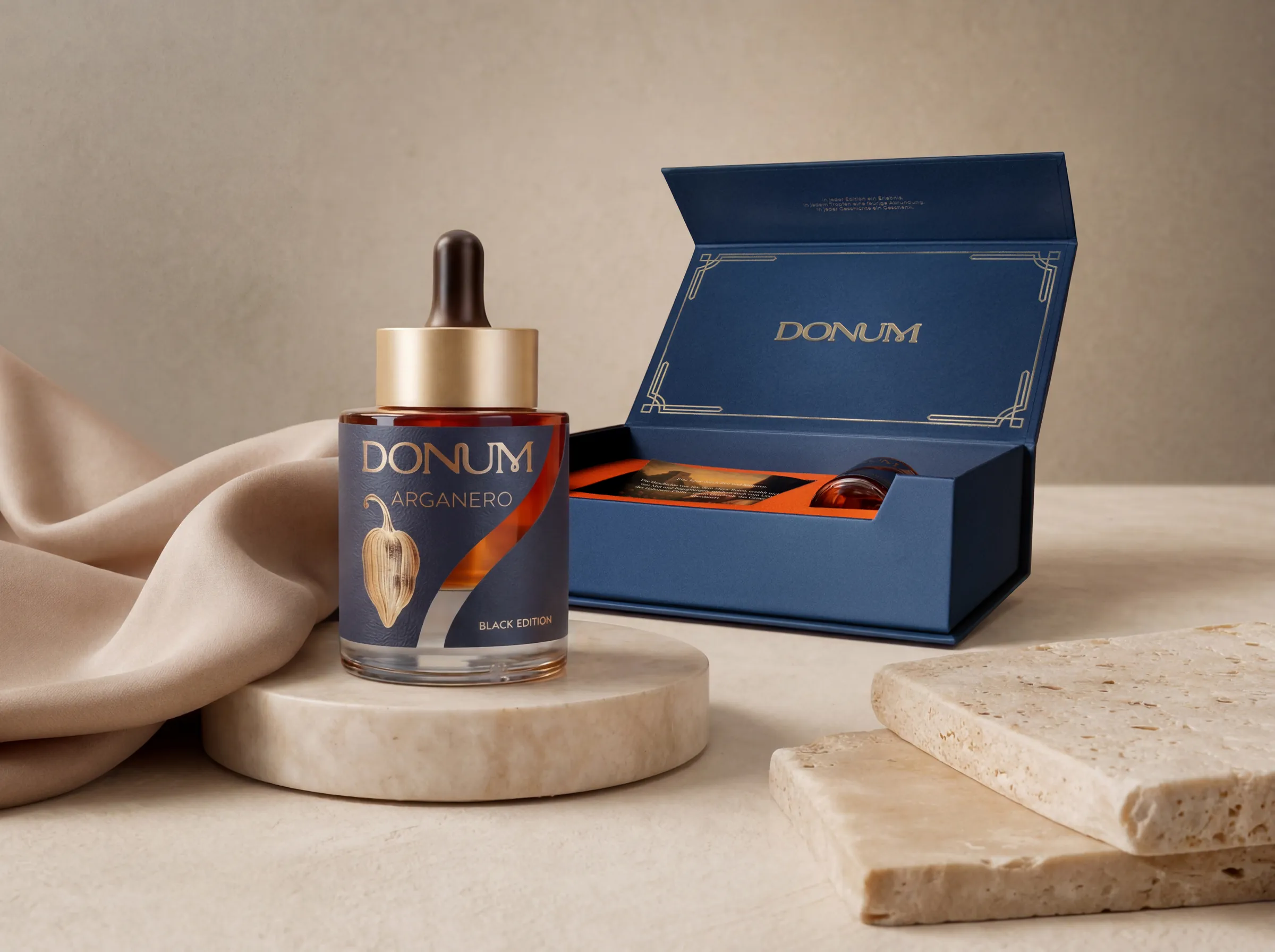 The ARGANERO flacon on marble beside the opened DONUM gift box